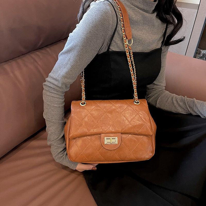 Lady's yellow-brown crossbody bag