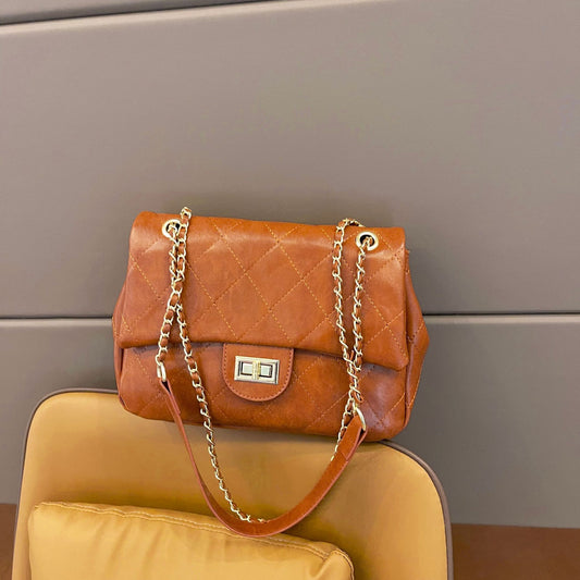Lady's yellow-brown crossbody bag
